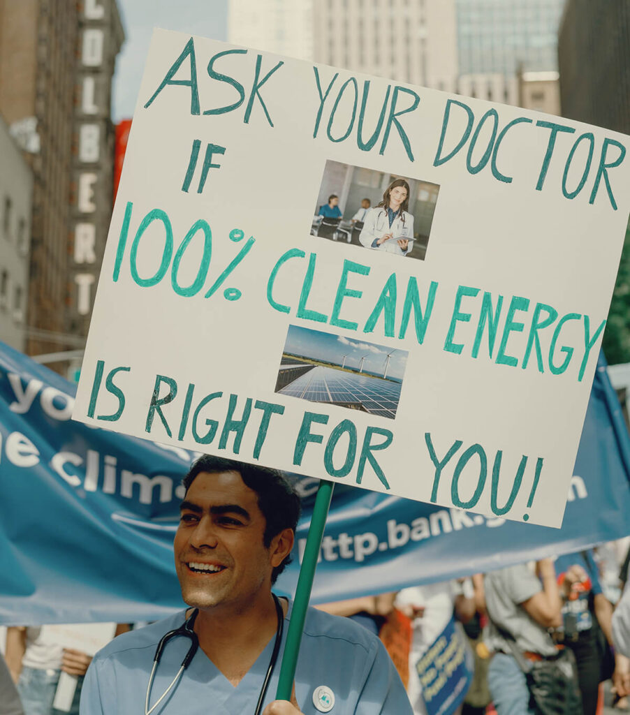 Health professionals protest on the streets of New York as part of the 'Health hub' during the March to End Fossil Fuels during New York Climate Week 17 September 2023. Ahead of this week’s Climate Ambition Summit, health professionals call for governments to commit to an accelerated, just and equitable phase-out of fossil fuels as the decisive path to health for all. Skyler Knutzen/Global Climate and Health Alliance.
